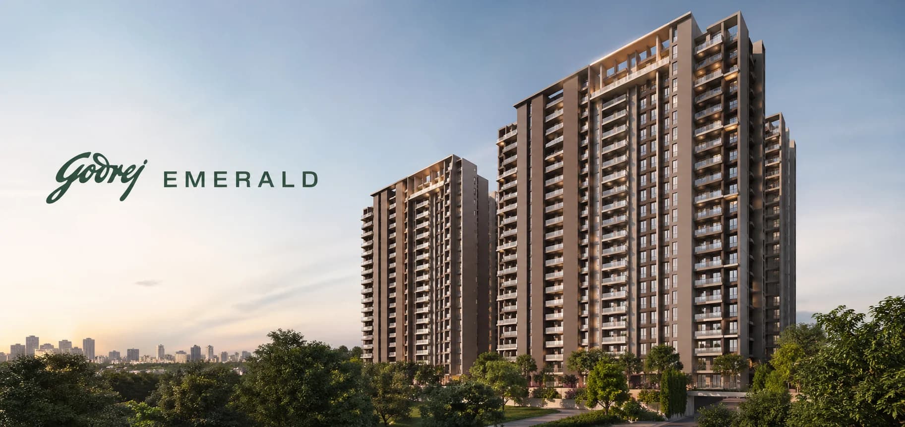 Scenic view of the Godrej Emerald residential towers located on Ghodbunder Road, Thane, featuring lush green surroundings and views of Yeoor Hills.