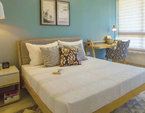 Spacious and elegantly designed master bedroom interior inside a Godrej Vanantara luxury apartment.